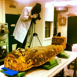 Photographing ongoing treatment of a sarcophagus at Cardiff University.  Jerrod Seifert