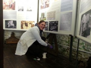 A lot of our time has been spent accessioning the 122 iron finds around the site. Here I am labelling large objects in the exhibition area. Photograph published with permission of the National Trust