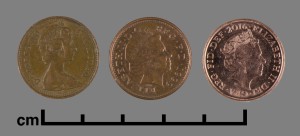 Three pennies, from 1980, 1999, and 2016 (left to right)