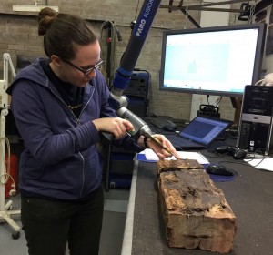 Scanning a piece of wood with the Faro Arm.