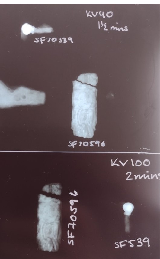 A close-up on X-ray K226 (described above) showing the rectangular strap at two different brightnesses that reveal a human face-like design within the knotwork.