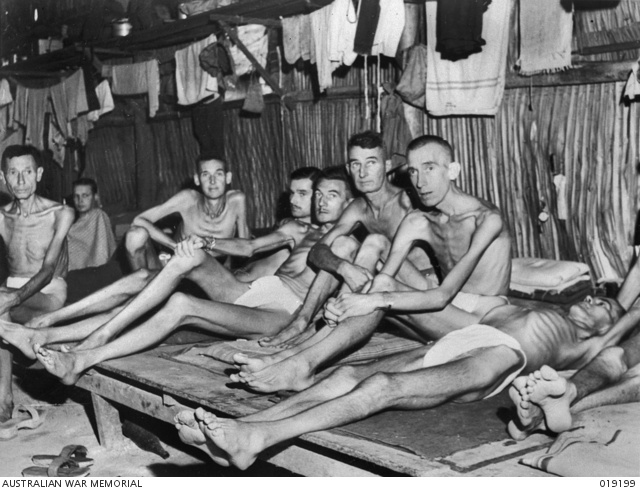 ‘A hospital ward in Singapore showing members of the 8th Division released from the Changi Prisoner-of-War camp at Singapore. All were suffering from malnutrition’, 1945, Australian War Memorial, 019199.