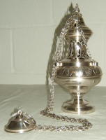 Silver thurible advertised by Luzar vestments: http://www.luzarvestments.co.uk/thuribles.htm