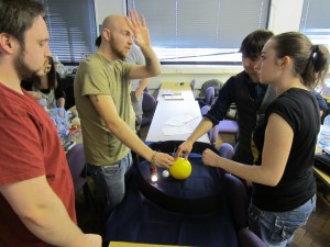 Cardiff University students demonstrate the lunar phases during the STARS training event.