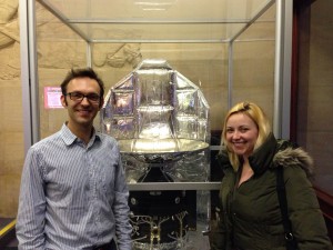 Dr Edward Gomez and Charlotte Church standing next to the scale model of the Herschel Space Observatory (whose SPIRE instrument was led by Head of School Professor Matt Griffin).