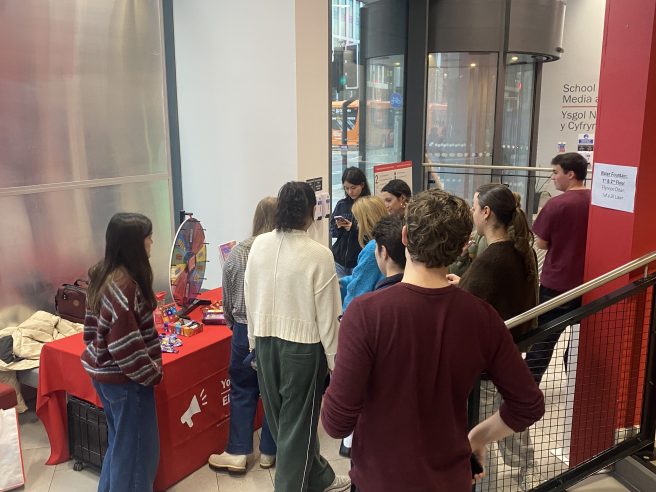 Students participating in the NSS stall.