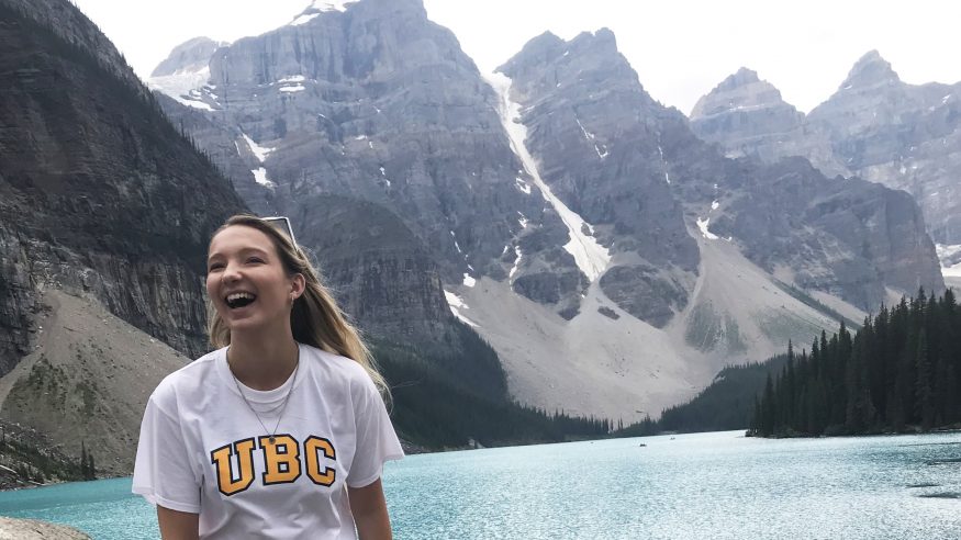 Student Camille Stanley in Canada by a lake.