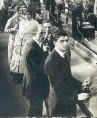 Photograph of a Chemistry Laboratory, c.1899, showing female students being educated alongside their male counterparts.