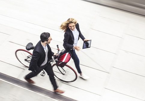 Active travel: two people walking/cycling to work