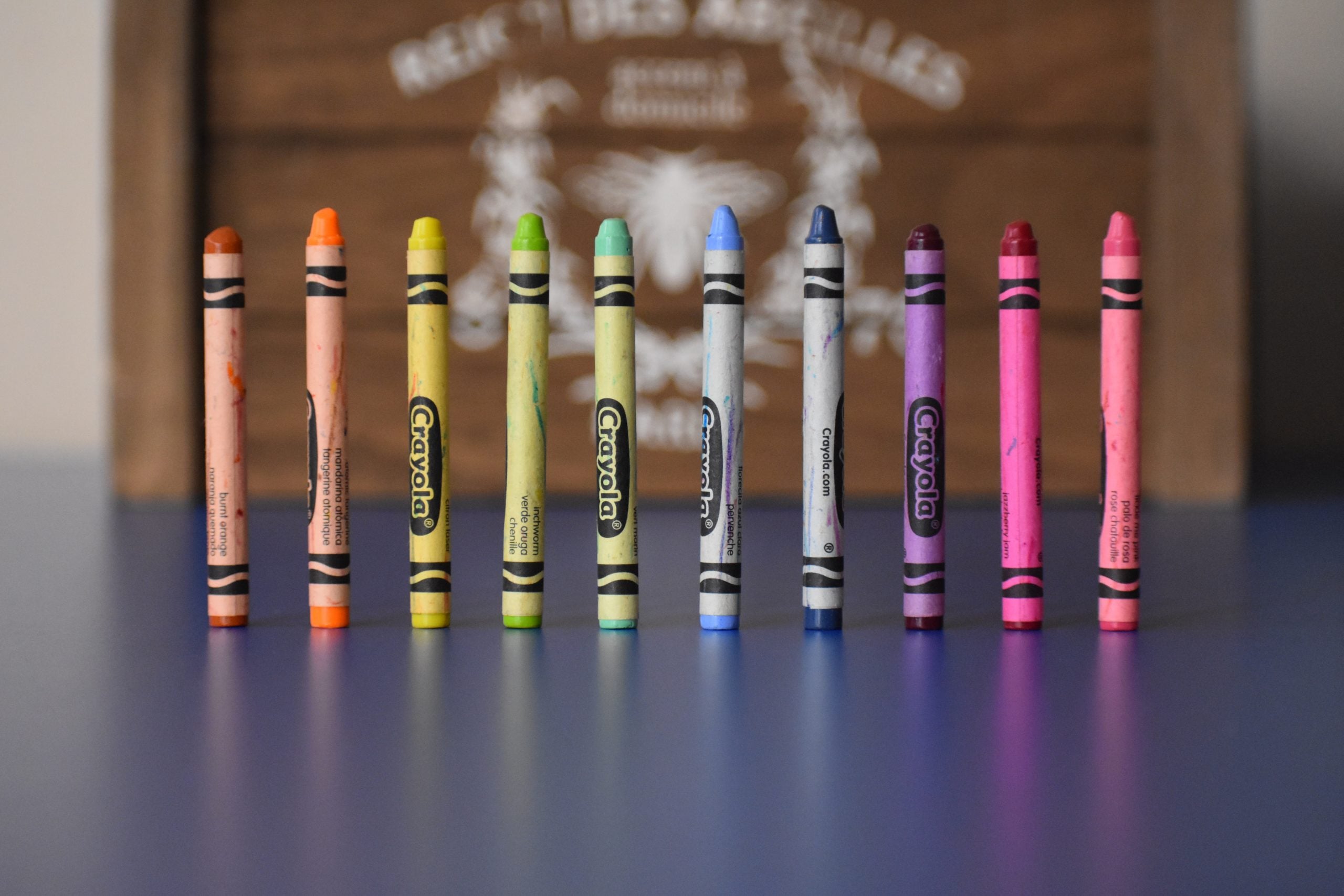 bright coloured crayons in a line